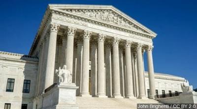 Justices Allow Enforcement of New Green Card Rule