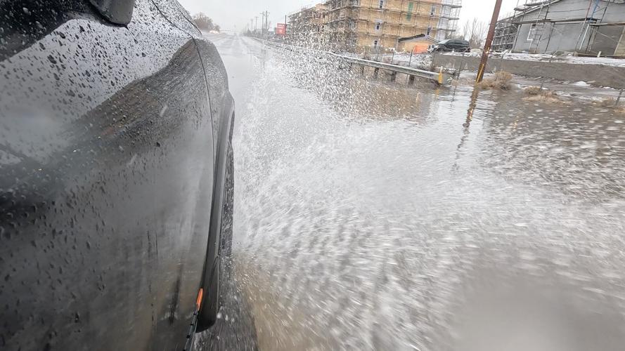 Car in flooded street