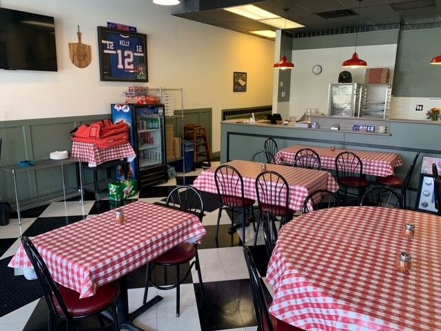 smiling with hope pizza set to open.jpg