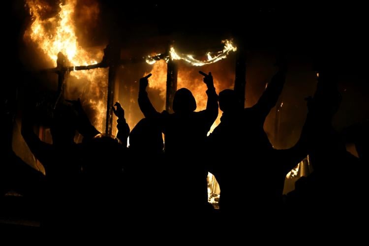 Tear gas, fires and clashes as anti-government unrest escalates in Albania, in photos