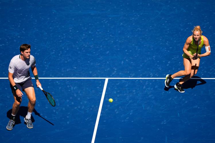 Top tennis stars team up for the U.S. Open mixed doubles tournament, in photos