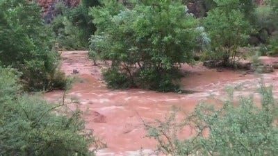 Flooding Forces Evacuations Near Waterfalls Off Grand Canyon