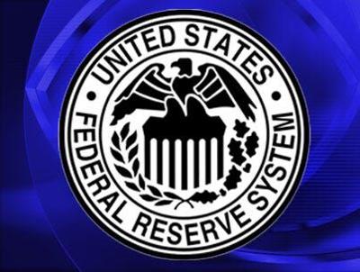 Fed Sees Stronger Economy But Leaves Key Rate at Record Low