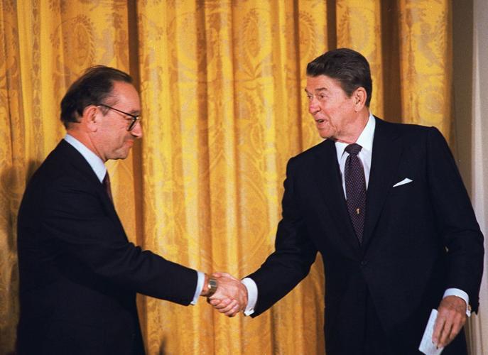Photos of late Fed chair Alan Greenspan through the years