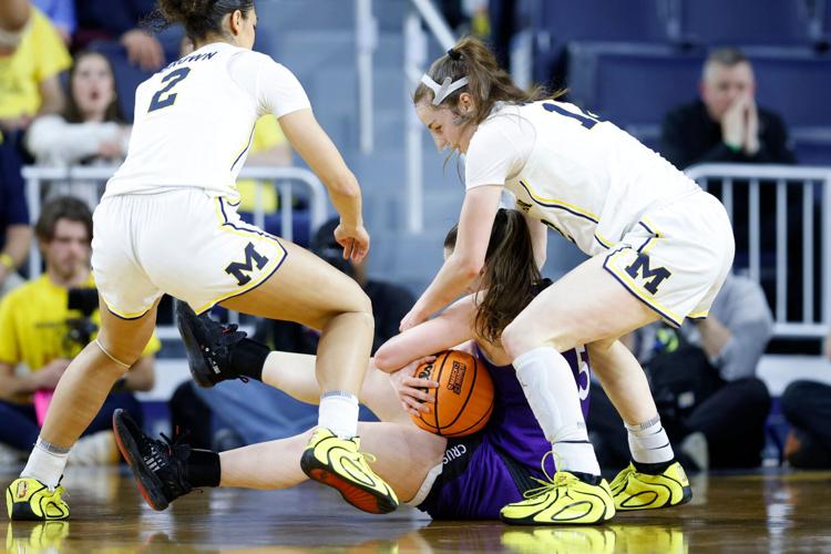 NCAA Holy Cross Michigan Basketball