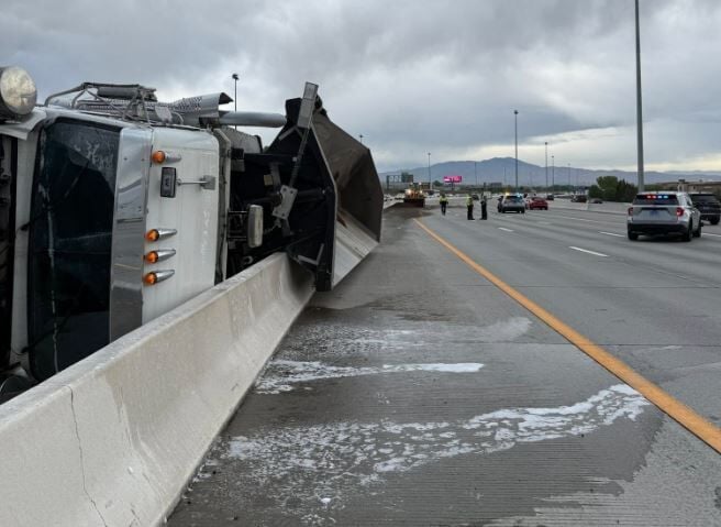 Dump truck hits median on I-580 south