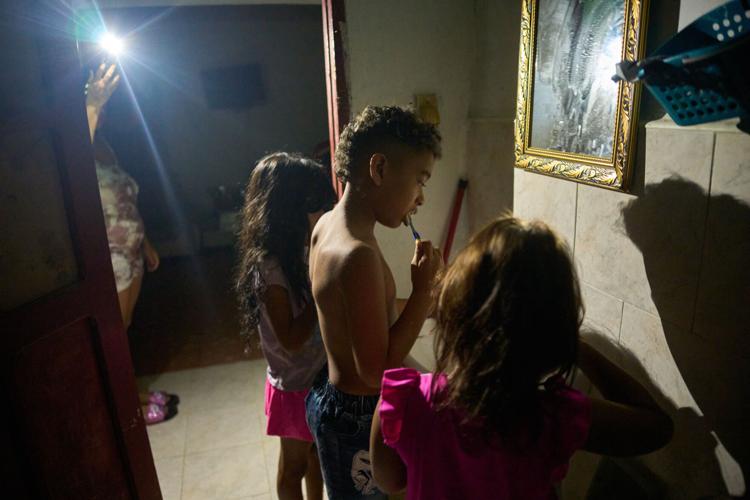 Photos of Cuban students returning to school as they face power and fuel shortages