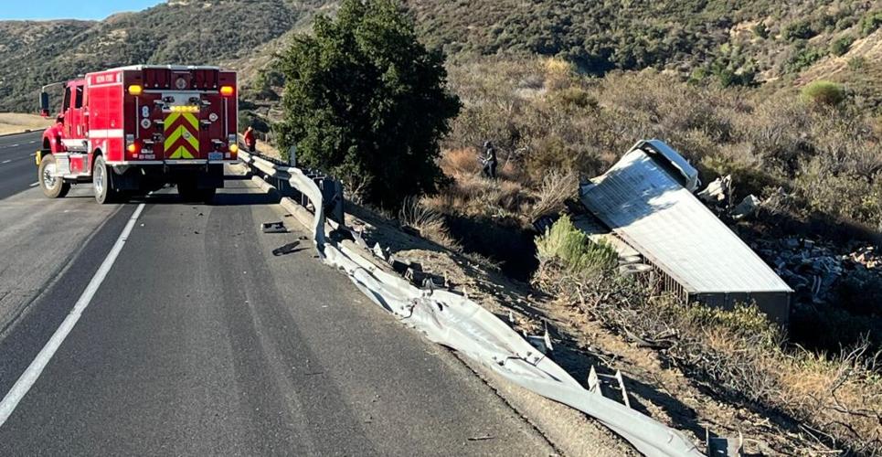 RFD truck near overturned semi-truck