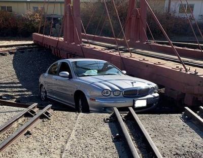 Man Arrested For Narcotics, Weapons Charges After Crashing Car Into Railroad Turntable Ditch