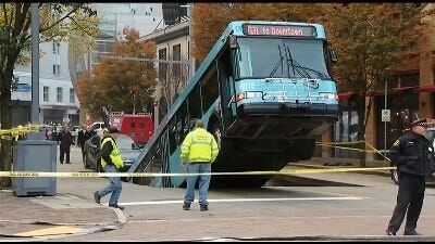 Sinkhole Opens in Pittsburgh, Swallows Part of City Bus During Rush Hour