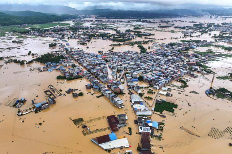 China Extreme Weather Asia Storms