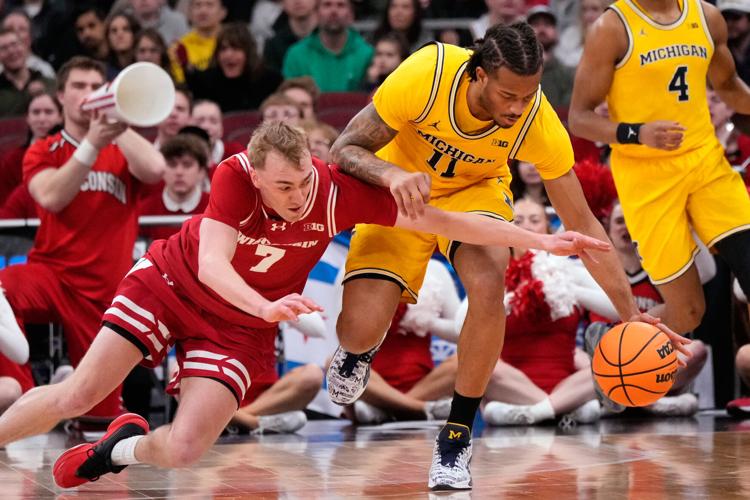 APTOPIX B10 Michigan Wisconsin Basketball