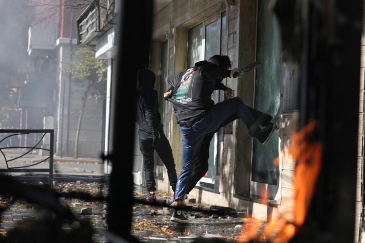 Tear gas, fires and clashes as anti-government unrest escalates in Albania, in photos
