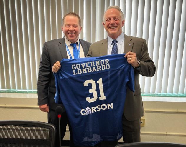 Carson City Superintendent Andrew Feuling awarded Nevadas Governor Joe Lombardo with an honorary custom Carson High Football jersey_ (002).JPG