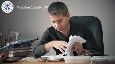 Washoe County logo with man working on a desk generic .jpg