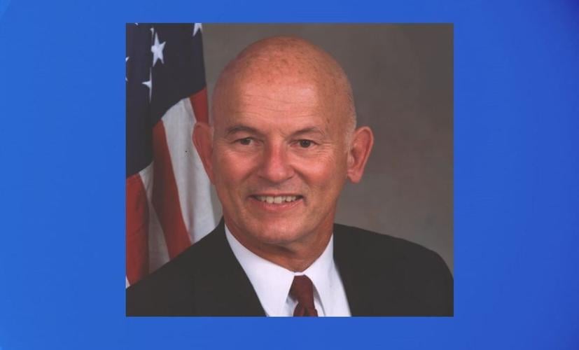 Dick Gammick on blue background