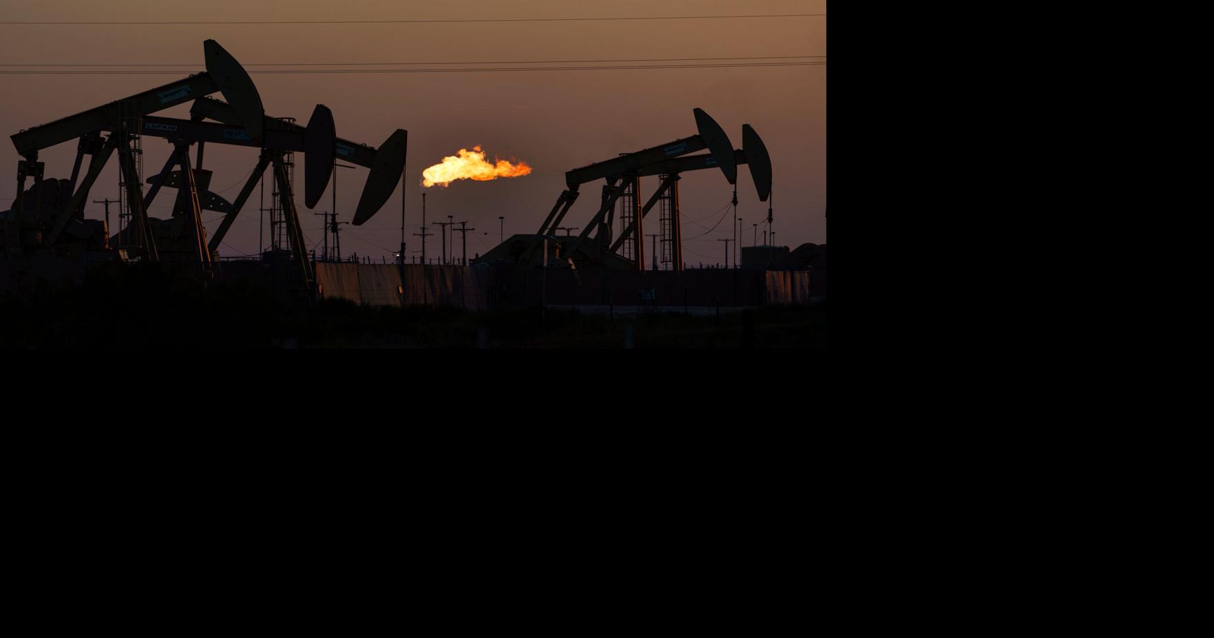 Trump says he's ending restrictions on climate-warming emissions from oil drilling | National News | 2news.com