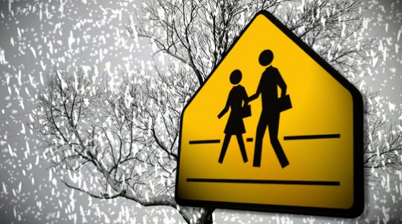 School sign with snow