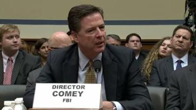 FBI Chief Denies Coordinating His Announcement on Clinton