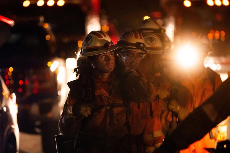 Photos show firefighters battling Southern California blaze