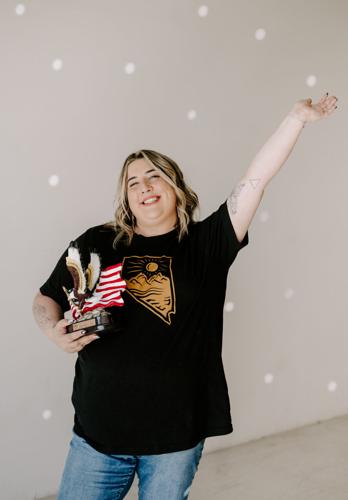 Sadie Feinberg with Young Entrepreneur of the Year 2023 Award