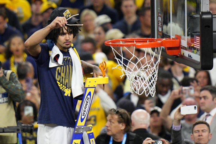 NCAA UConn Michigan Basketball