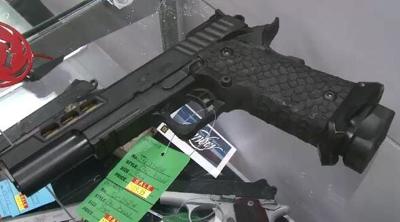 Gun Dealers Prepare for New Background Check Law