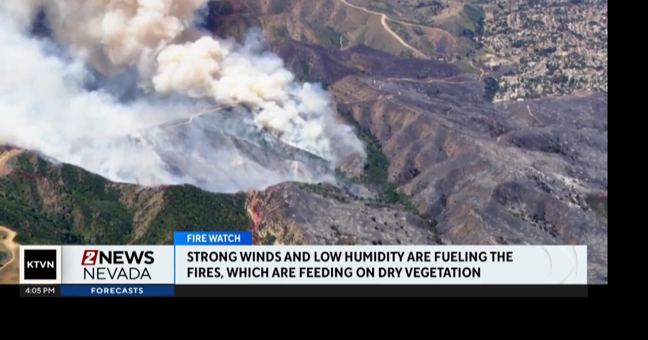 Crews in southern California working to contain outbreak of wind-driven ...