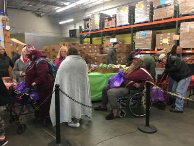 St. Vincent’s Food Pantry Distributes Holiday Food Bags to 2,000 Families