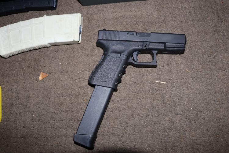 Medina Glock with 30 round magazine.JPG