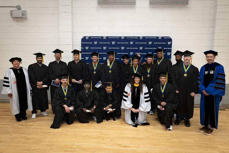 WNC President Dr. J. Kyle Dalpe and NSHE Board of Regents Carol Del Carlo and Heather Brown are pictured with the grads following a commencement ceremony at NNCC.jpg