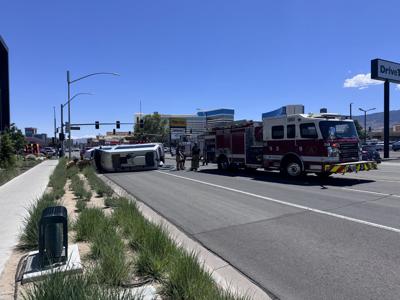One person taken to the hospital after rollover on South Virginia St.