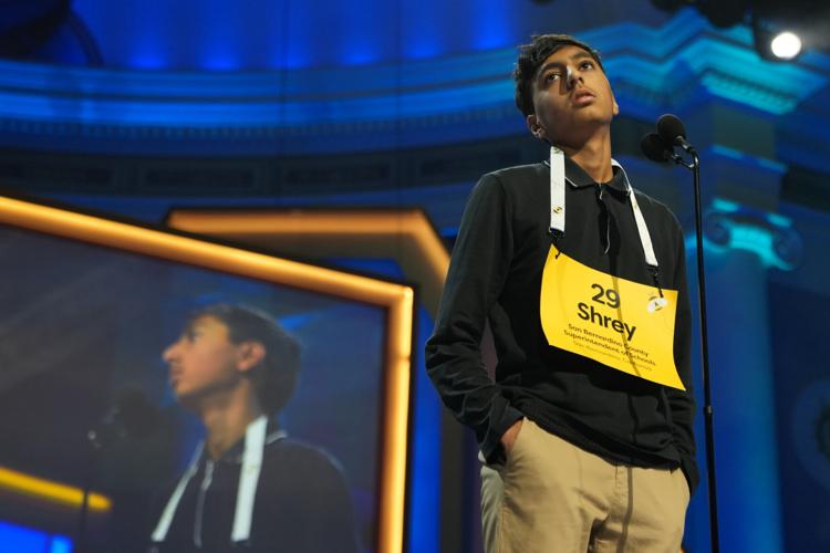 Photos of students competing for the Scripps National Spelling Bee trophy