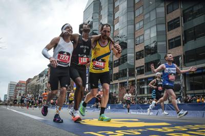 Boston Marathon Helping Runners