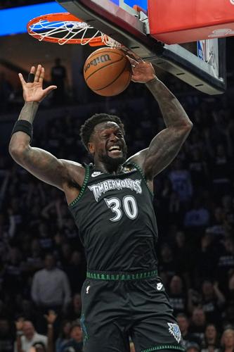 APTOPIX Nuggets Timberwolves Basketball