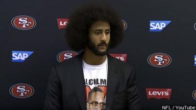 Colin Kaepernick Hands Out Old Suits Outside Parole Office