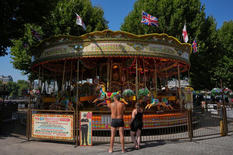 Britain records its hottest day of the year as summer heat grips parts of Europe, in photos
