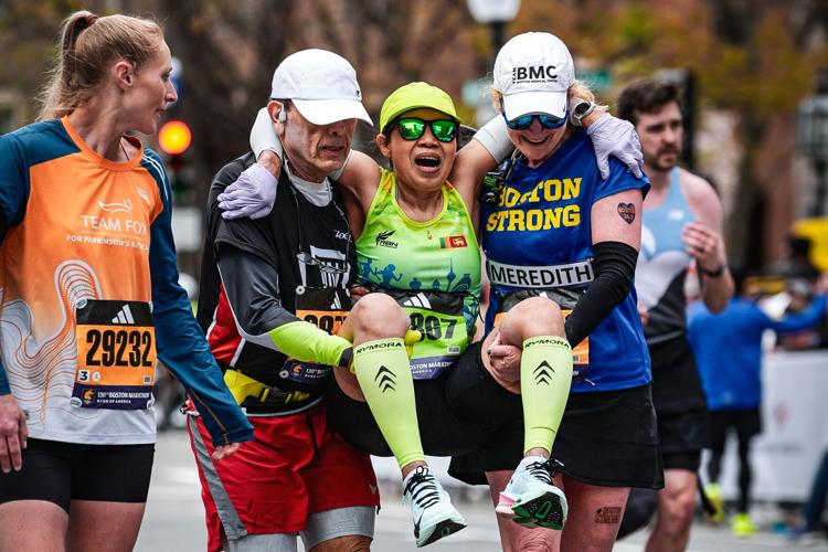 Boston Marathon Helping Runners