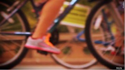 Riding bike MGN.PNG