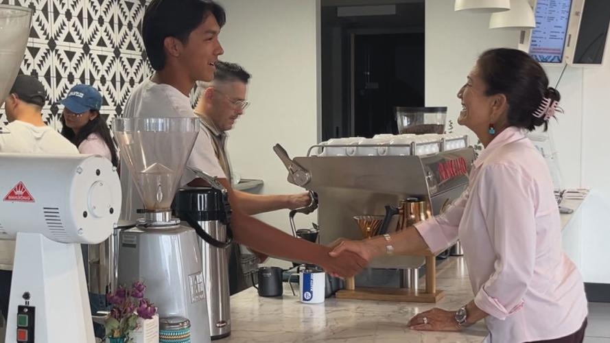 Interior Secretary Deb Haaland meets with staff at native-owned Star Village Coffee in Reno