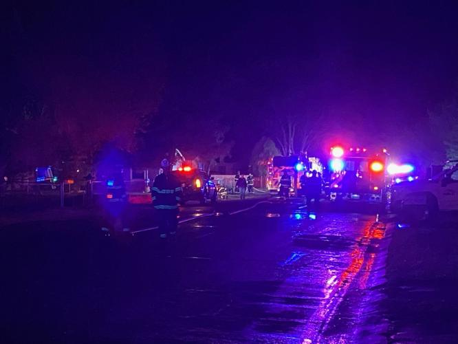 Carson City Firefighters Outside Poole Way Home