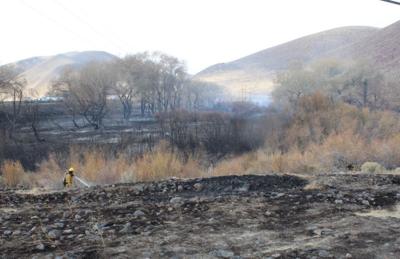 Officials: Utility Lines Started Brush Fire Near Derby Dam