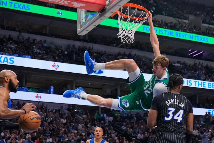 APTOPIX Magic Mavericks Basketball