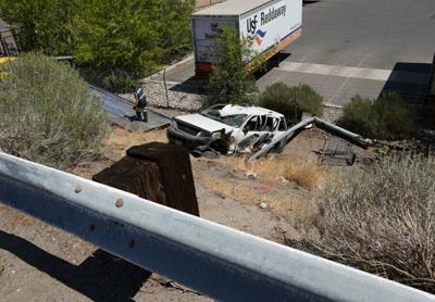 Rock Blvd. Reopens After SUV Crashes Through Guardrail, Down Embankment