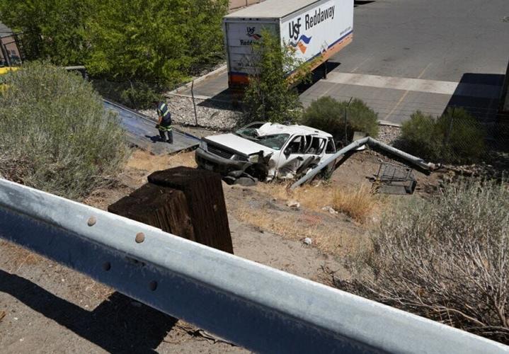 Rock Blvd. Reopens After SUV Crashes Through Guardrail, Down Embankment