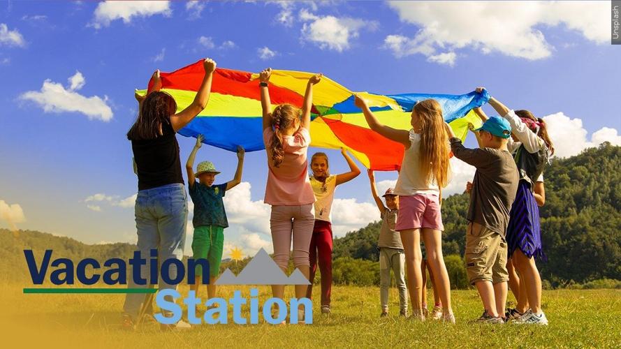 Kids Playing w/ Vacation Station Logo