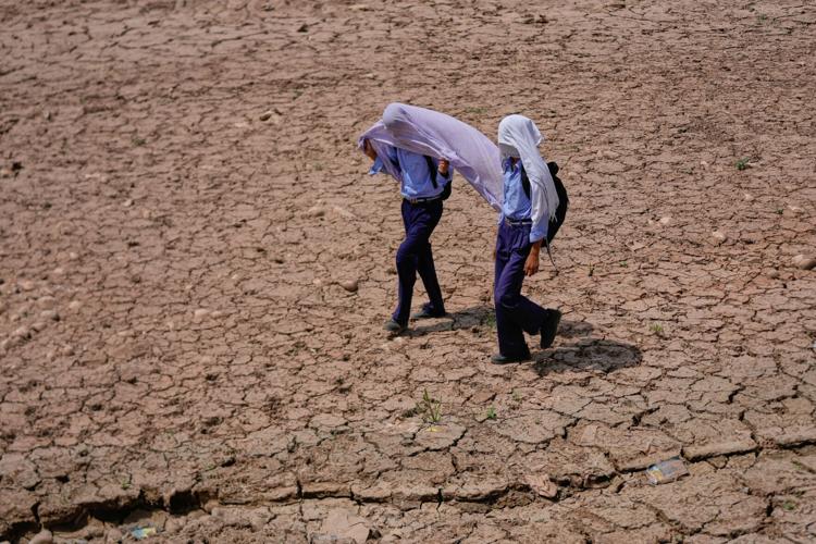 Photos show India sweltering under a severe heat wave