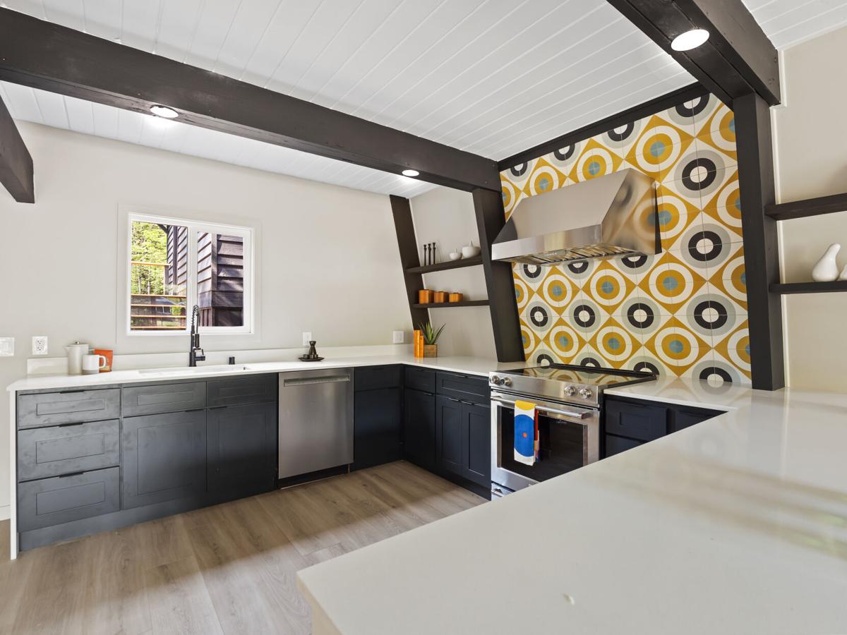 A Black Kitchen Is A Bold Design Decision For The Interior Of This  Remodeled 1960s Home