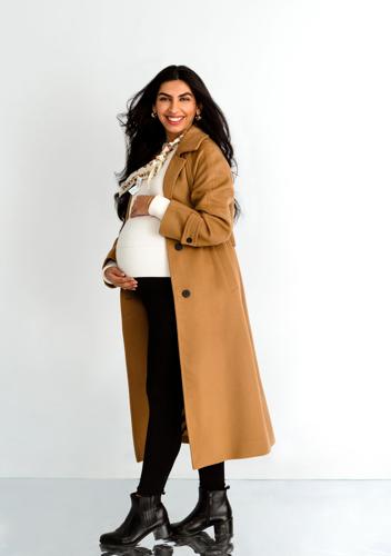 Brown coat: Kindersalmon; Neck scarf: Coach; White sweater: Banana Republic; Leggings: Hatch; Jewelry: Family heirlooms