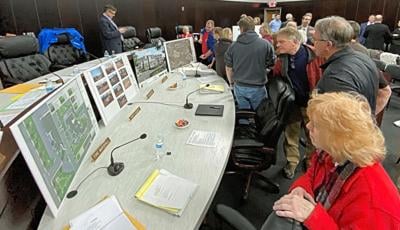Members of the public inspect Allegro's plans